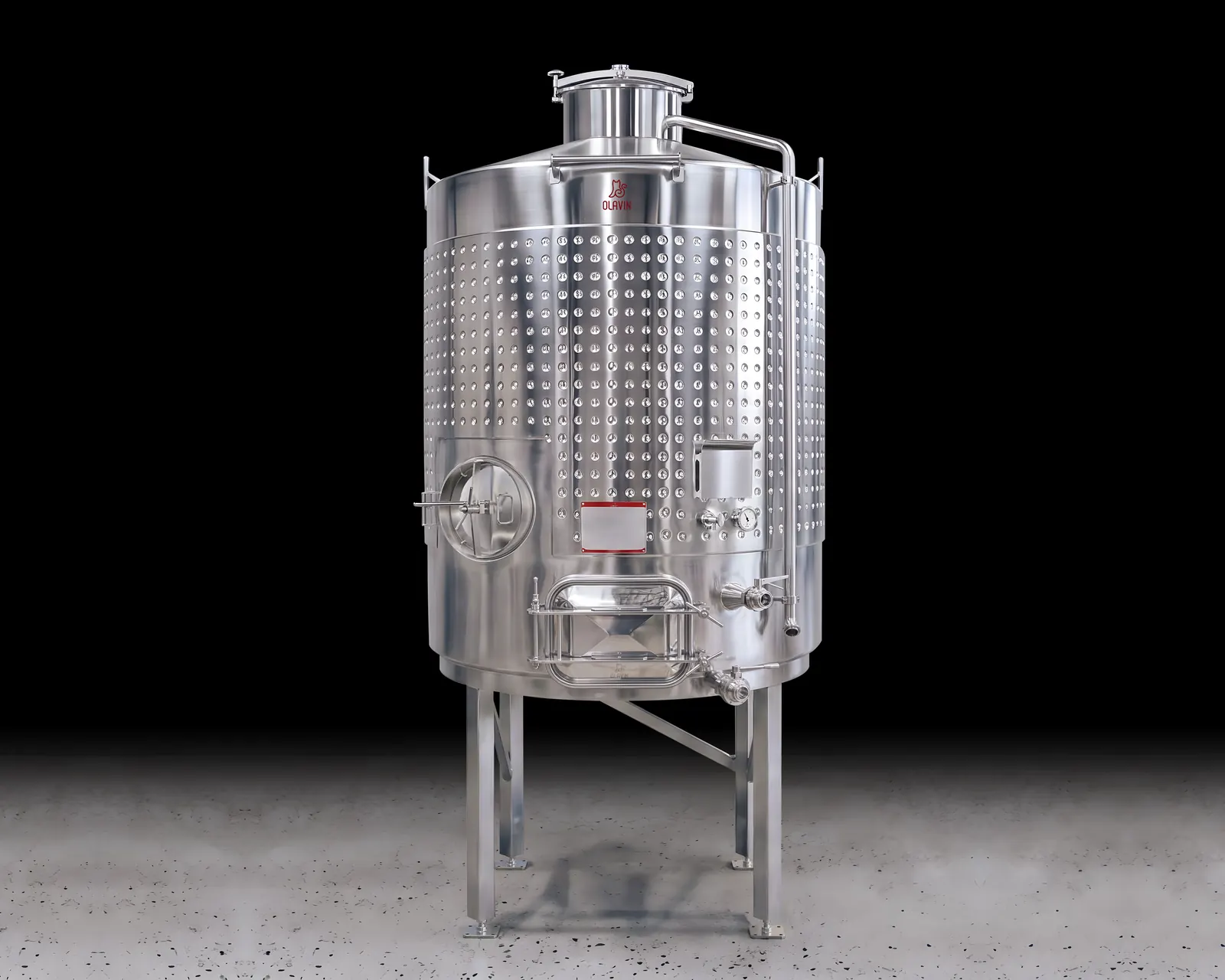 A single Olavin Enclosed Fermenter: a dimple-jacketed stainless tank with a top manway, a round side door and the oval racking door at its base