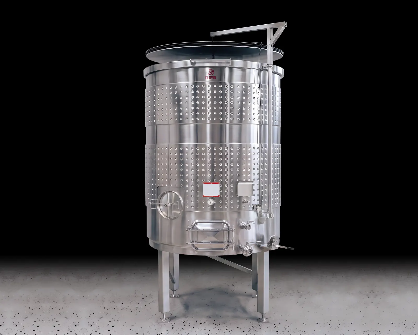 A single Olavin Variable Capacity Tank with its floating lid raised on the lifting arm above the open tank mouth